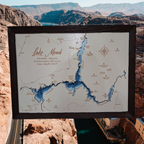 Lake Mead layered bathymetric wood map — Painted Baltic Birch, Charwood (Dark Brown), Hoover Dam scenic background (digital product mockup)